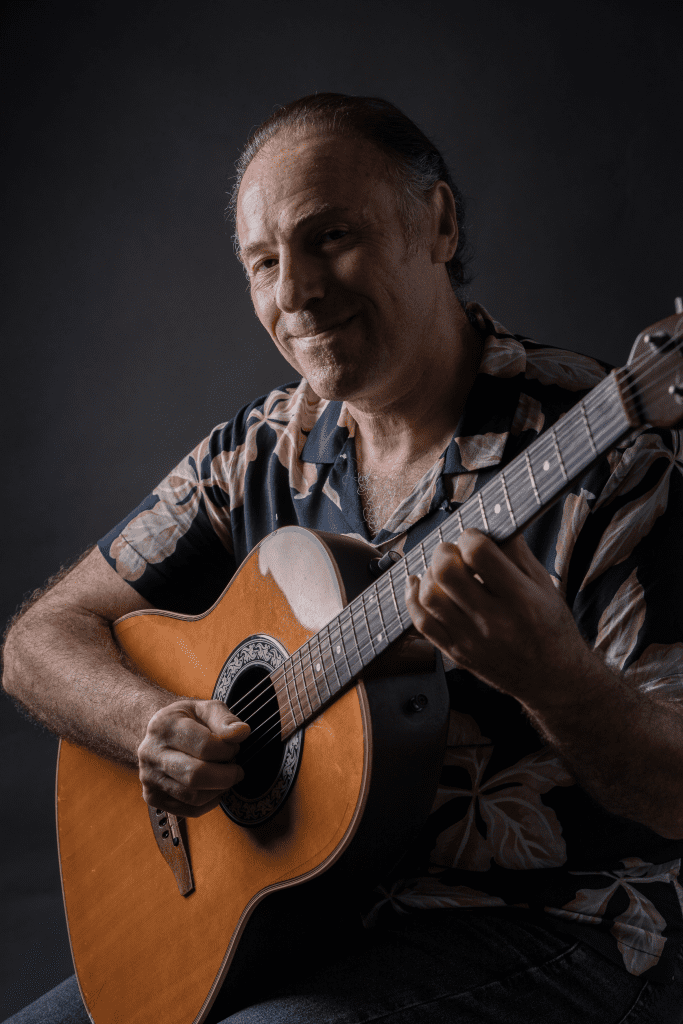 Guitarist Adel Jouini playing acoustic guitar, recorded at SEGPOP Studios